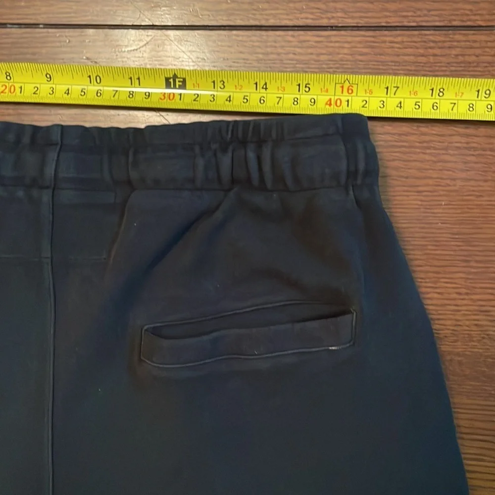 True Religion knit shorts. Large. Black. Metal logo. Some wear